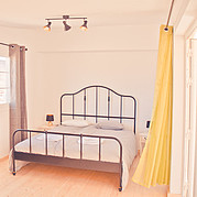 [Translate to Italiano:] Garten Appartement Schlafzimmer, Surf Villa Fuerteventura